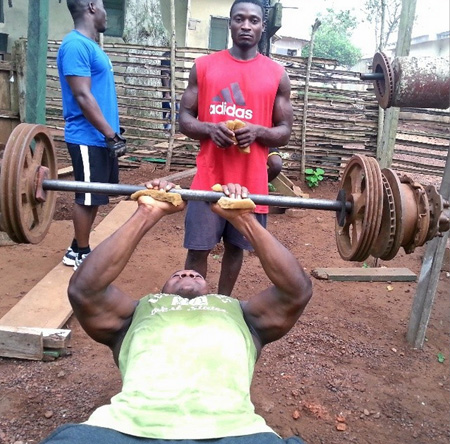This Beast African Bodybuilder's Backyard Gym Makes Prison 