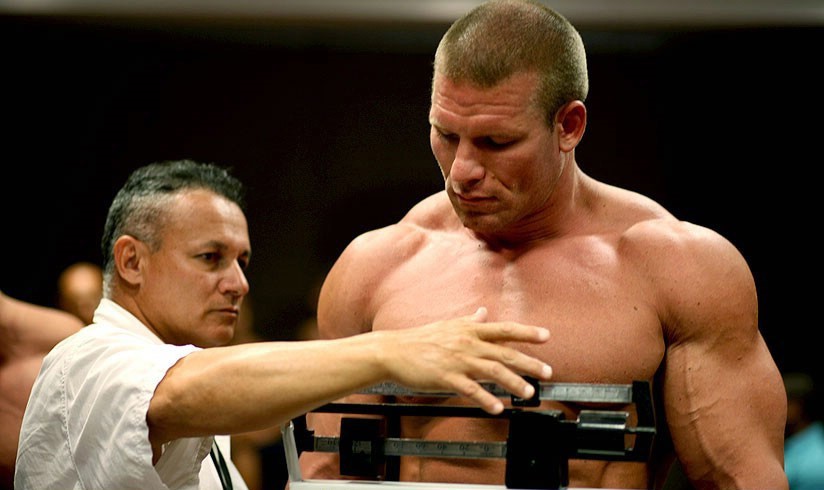 bodybuilder at a weigh-in before a show