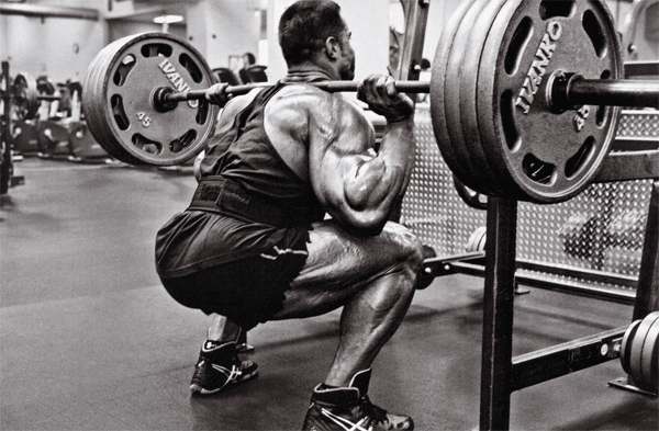 bodybuilder squatting