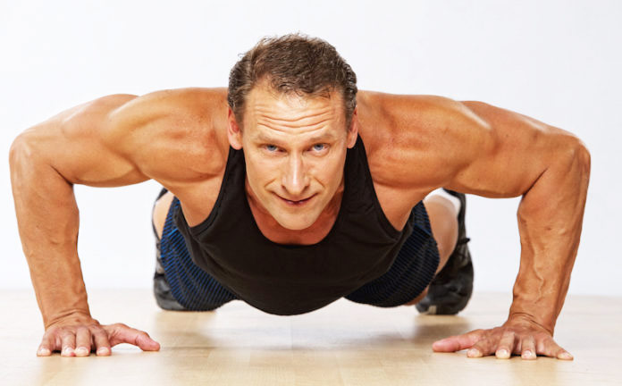 a man over 40 performing push ups