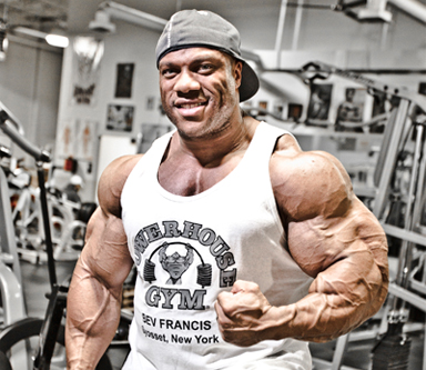 phil heath flexes his bicep