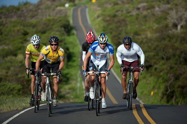 a group of 5 tour de france cyclists