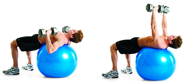 a man performing incline pullovers on a stability ball for a chest workout without bench 