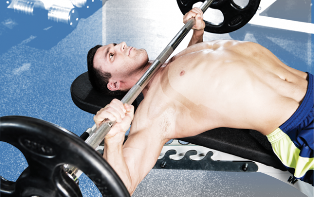 a bodybuilder performing the guillotine press