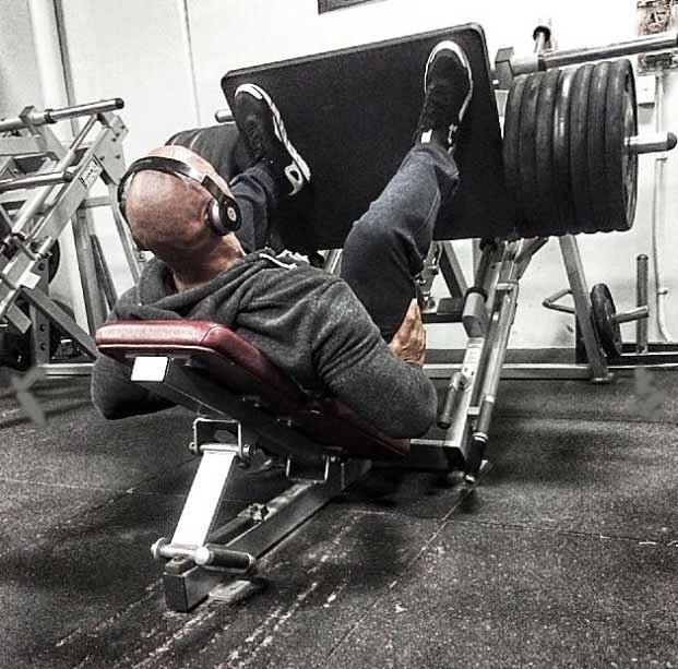 the rock performing leg presses