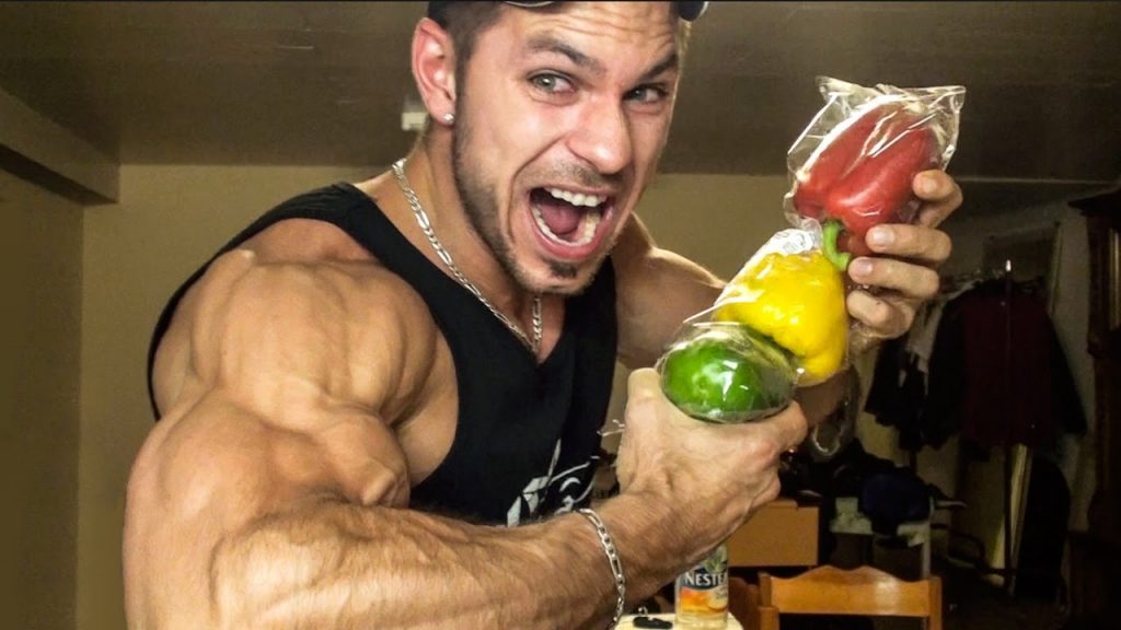 bodybuilder holding a pack of pepper