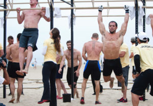 CrossFit champion and competitor Rich Froning performs pull up