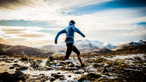 man runs whilst preparing for beginner obstacle course training