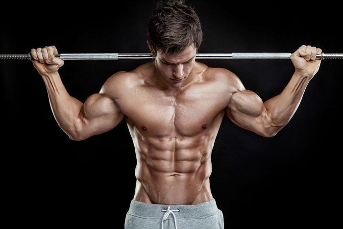 bodybuiler shows developed core strength and why its important