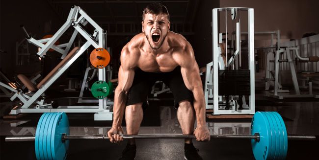 Deadlifting in the gym with proper weightlifting form