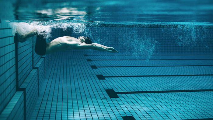 athlete developing run ready cardio through swimming to become running fit without running