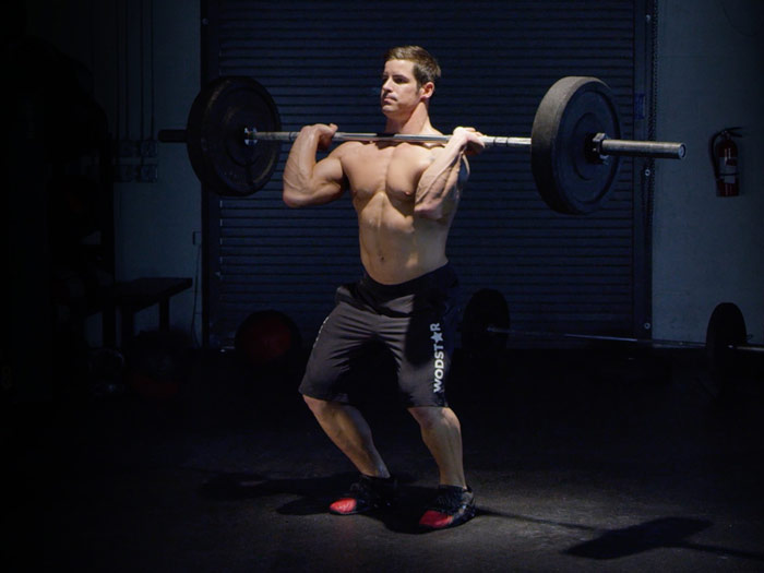 athlete performs push press for brock lesnar power