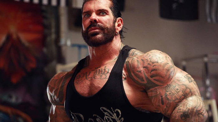 pro bodybuilder Rich Piana showing muscular arms