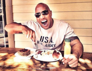 dwayne johnson chewing on protein food