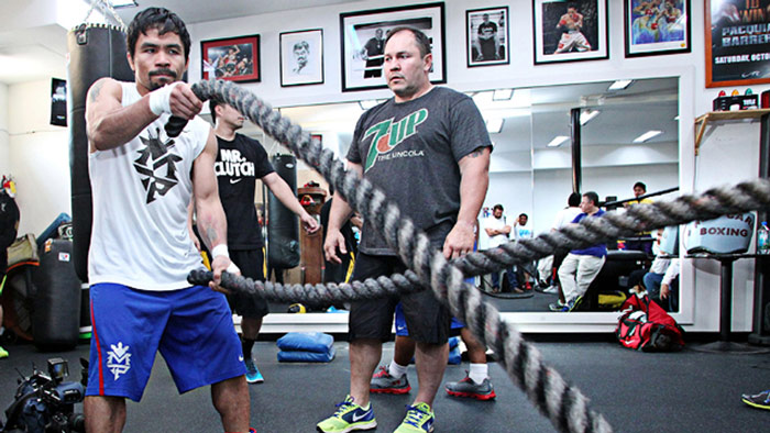 Champion boxer Manny Pacquiao training with battle ropes