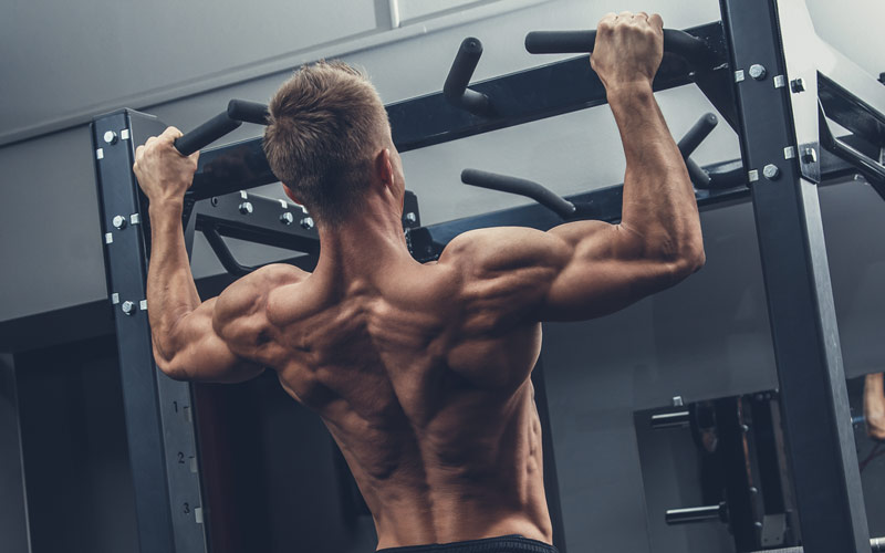 athlete performing pull ups