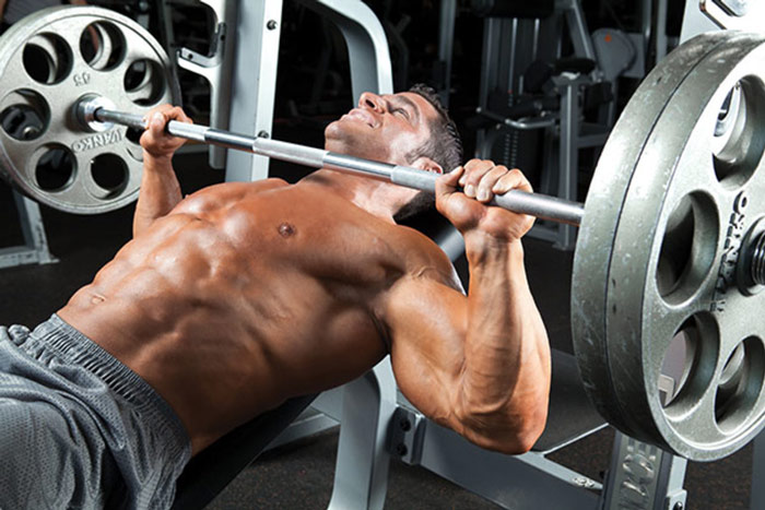 bodybuilder utilising incline bench press for upper chest