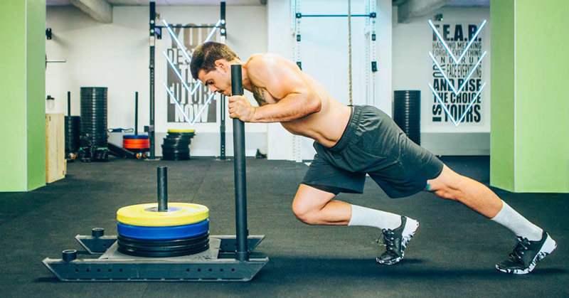 athlete pushing Prowler