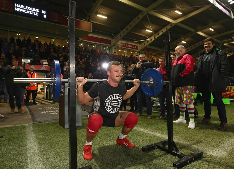 fergus crawley squatting in preperation for guiness world record squat attempt