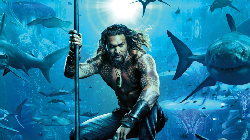 Actor Jason Mamoa posing as Aquaman