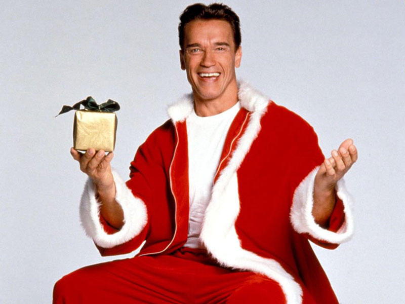Arnold Schwarzenegger dressed as Santa
