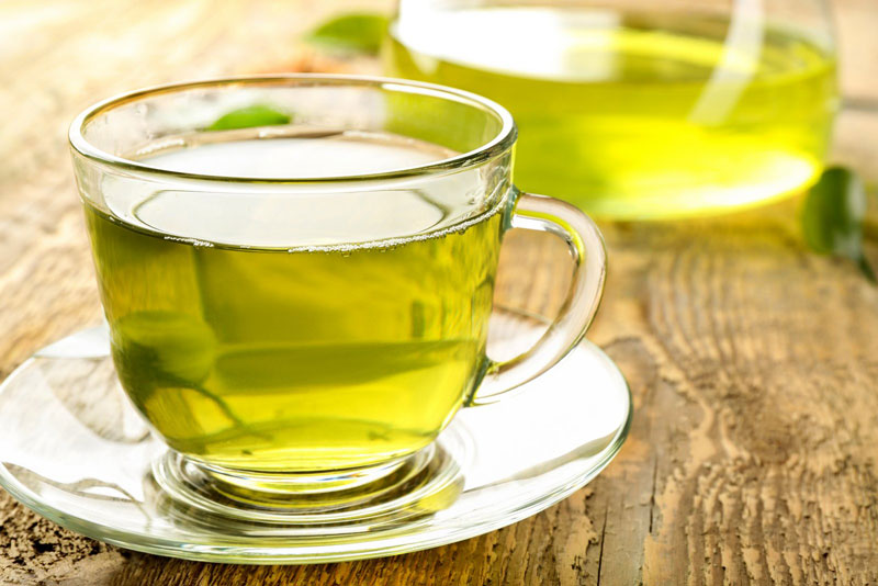Fat burning green tea brewed in glass cup