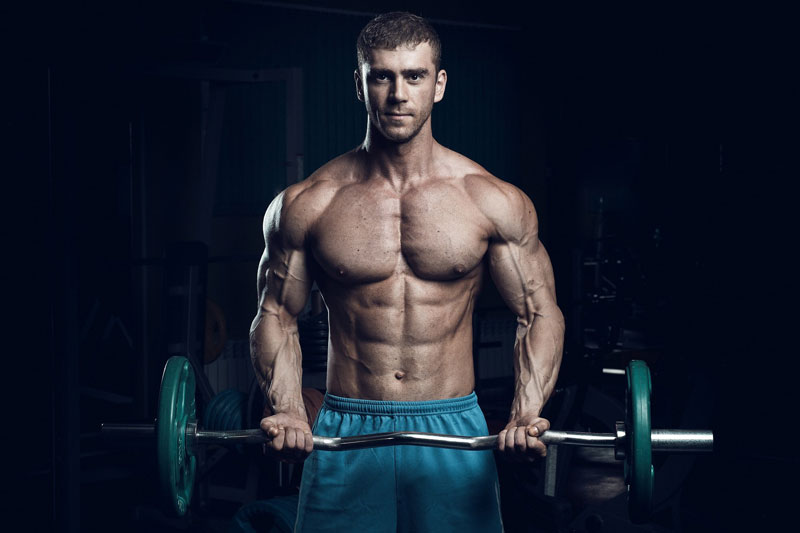 Shredded man with barbell
