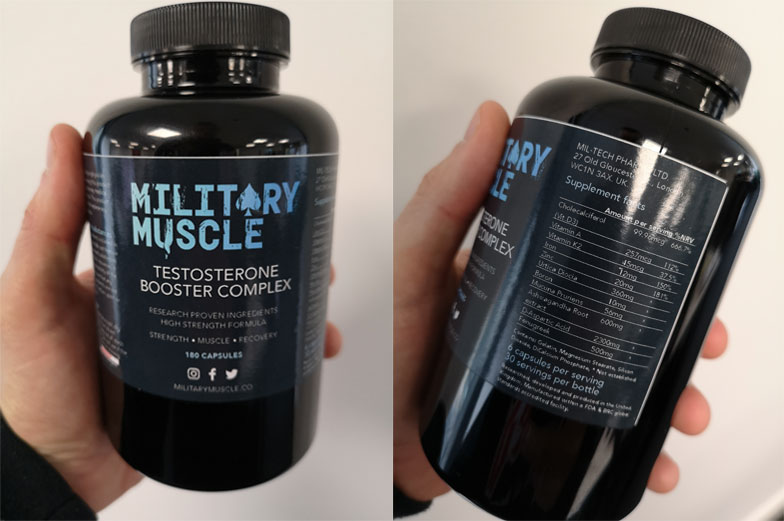 Bottle of Military Muscle in hand